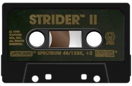 Cartridge artwork for Strider 2 on the Sinclair ZX Spectrum.