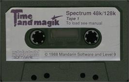 Cartridge artwork for Time and Magik - The Trilogy on the Sinclair ZX Spectrum.