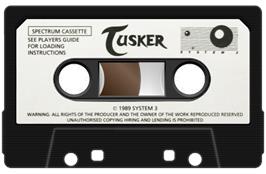 Cartridge artwork for Tusker on the Sinclair ZX Spectrum.