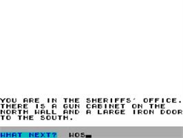 In game image of Ghost Town on the Sinclair ZX Spectrum.