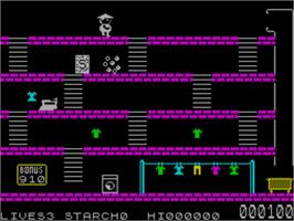 In game image of Mr. Wong's Loopy Laundry on the Sinclair ZX Spectrum.