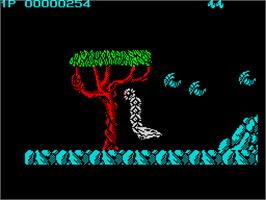 In game image of Saint Dragon on the Sinclair ZX Spectrum.