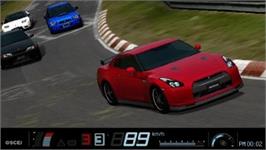 In game image of Gran Turismo on the Sony PSP.