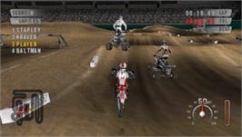 In game image of MX vs. ATV: On the Edge on the Sony PSP.