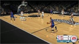 In game image of Nba Live 06 on the Sony PSP.