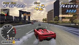 In game image of Out Run 2006: Coast 2 Coast on the Sony PSP.