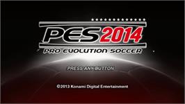 Title screen of Pro Evolution Soccer 2014 on the Sony PSP.