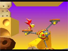 In game image of Alfred Chicken on the Sony Playstation.