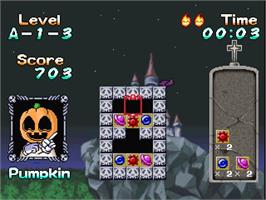 In game image of Puzznic on the Sony Playstation.