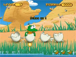 In game image of Schnappi - Das Kleine Krokodil - 3 Fun-games on the Sony Playstation.