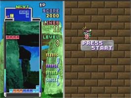 In game image of Tetris Plus on the Sony Playstation.