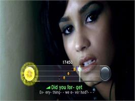 In game image of Disney Sing It - Pop Party on the Sony Playstation 2.