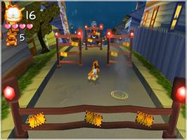 In game image of Garfield Lasagna World Tour on the Sony Playstation 2.