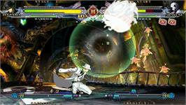 In game image of BlazBlue Continuum Shift on the Taito Type X2.