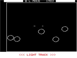 In game image of Light Track on the Tangerine Oric.