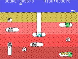 In game image of Dig Dug on the Texas Instruments TI 99/4A.